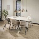 Table ovale SILAS 180 cm en céramique 3D travertin avec piètement en métal
